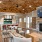 Fireside seating in front of wall mounted tv in clubhouse at The Laurent at Carolina Forest