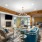 Recessed and chandelier lighting in a more cozy section of the clubhouse at The Laurent at Carolina Forest