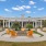 Pergola surrounding outdoor firepit with seating at The Laurent at Carolina Forest