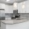 Brightly lit modern kitchens in apartment homes at The Laurent at Carolina Forest